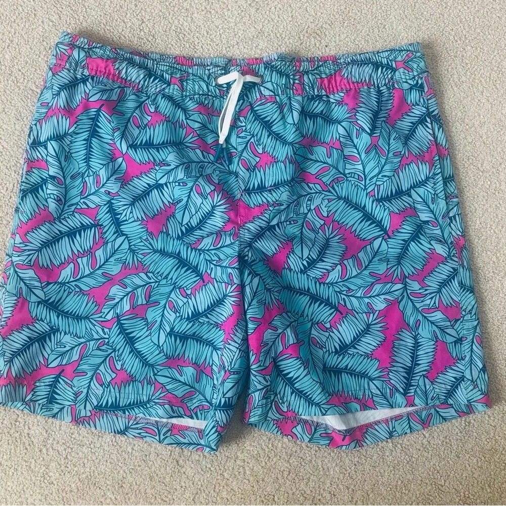 Vibrant Blue and Pink Leaf Pattern Swim Trunks